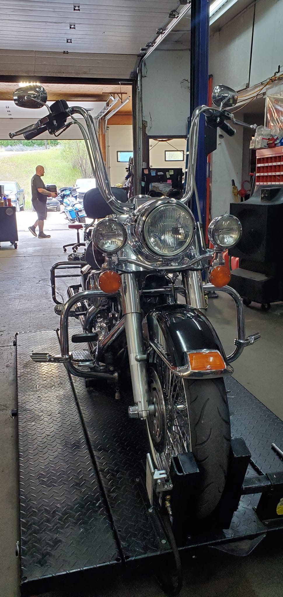 Classic Harley-Davidson motorcycle being serviced